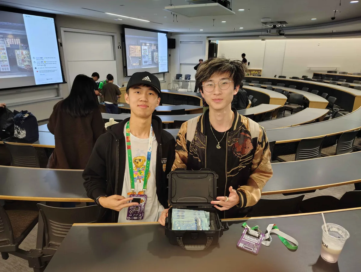 The Dogwatch team holding the prize case